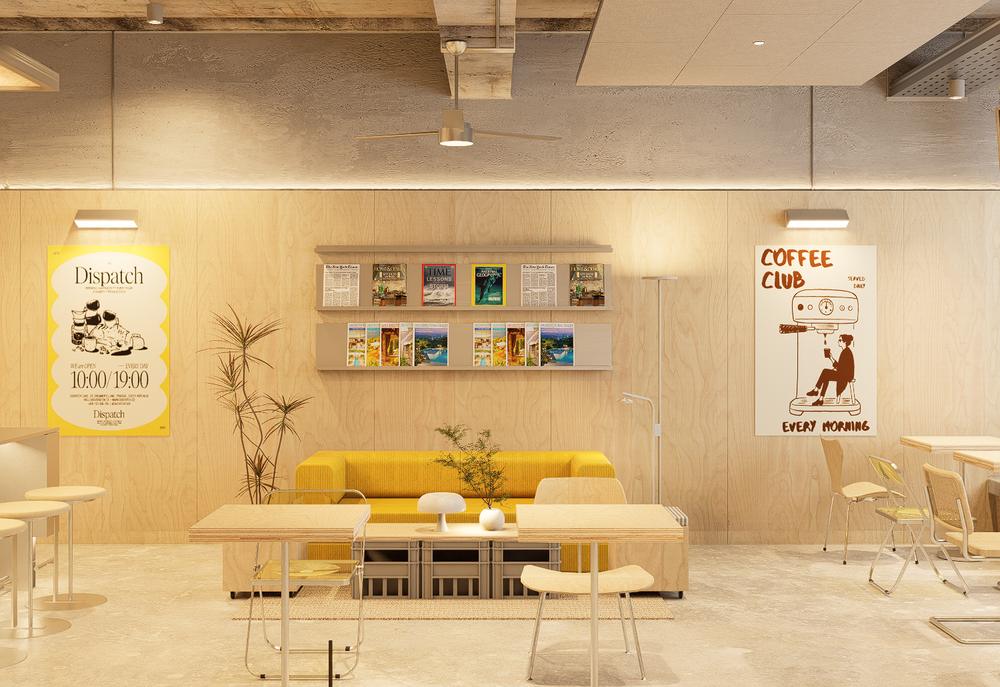 Seating area with yellow banquette, magazine wall and plywood tables